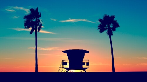 Lifeguard-tower-with-palm-trees-on-a-beach-at-sunset-San-Diego-California-USA.jpg