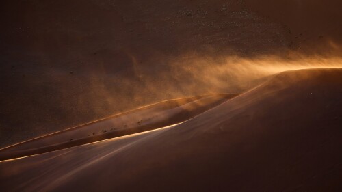 Sand-blowing-off-the-top-of-a-dune-in-Sossusvlei-Namib-Naukluft-National-Park-Namibia.jpg