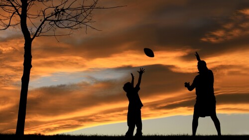 Silhouette-of-father-playing-football-with-his-son.jpg