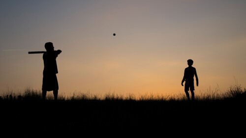 Silhouette-of-man-and-teenage-boy-playing-baseball.jpg