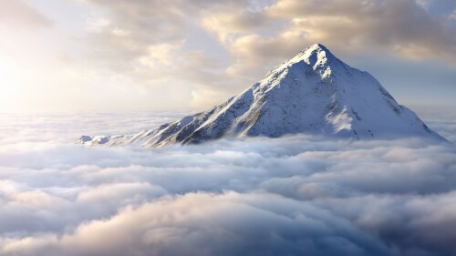 Snow-covered-mountaintop-above-clouds.jpg