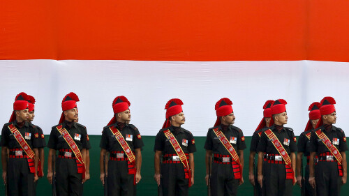 Soldiers-stand-guard-in-front-of-a-tricolour-flag-rehearsal.jpg