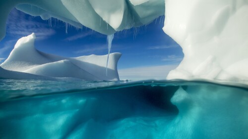 Underwater-view-of-arched-Iceberg-floating-near-Enterprise-Island-Antarctica.jpg