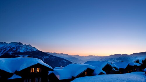 Winter-sunset-over-the-chalets-Lapland-Sweden.jpg